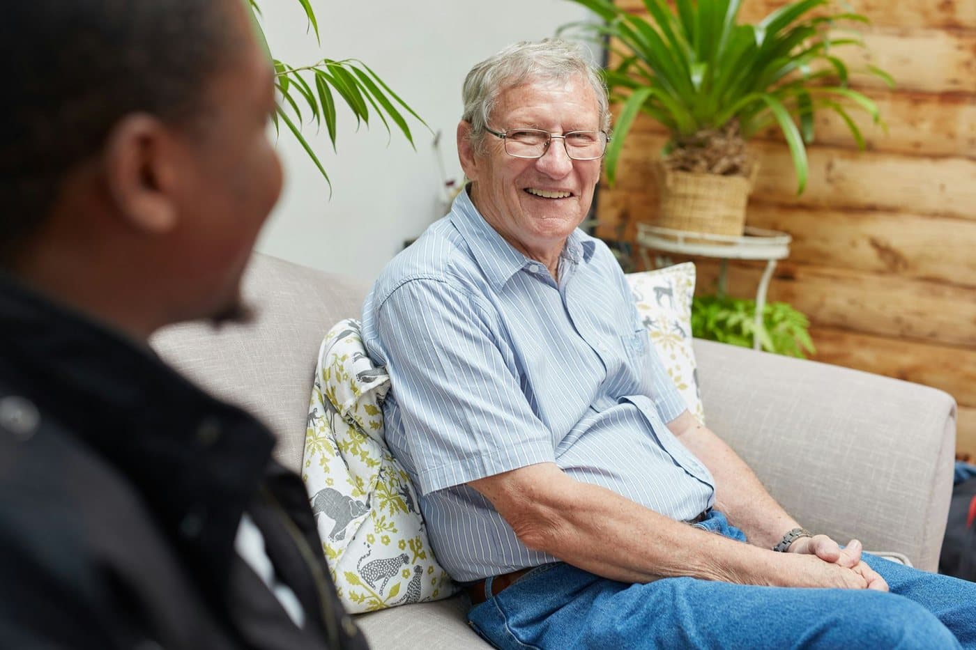 Two men sitting together in conversation