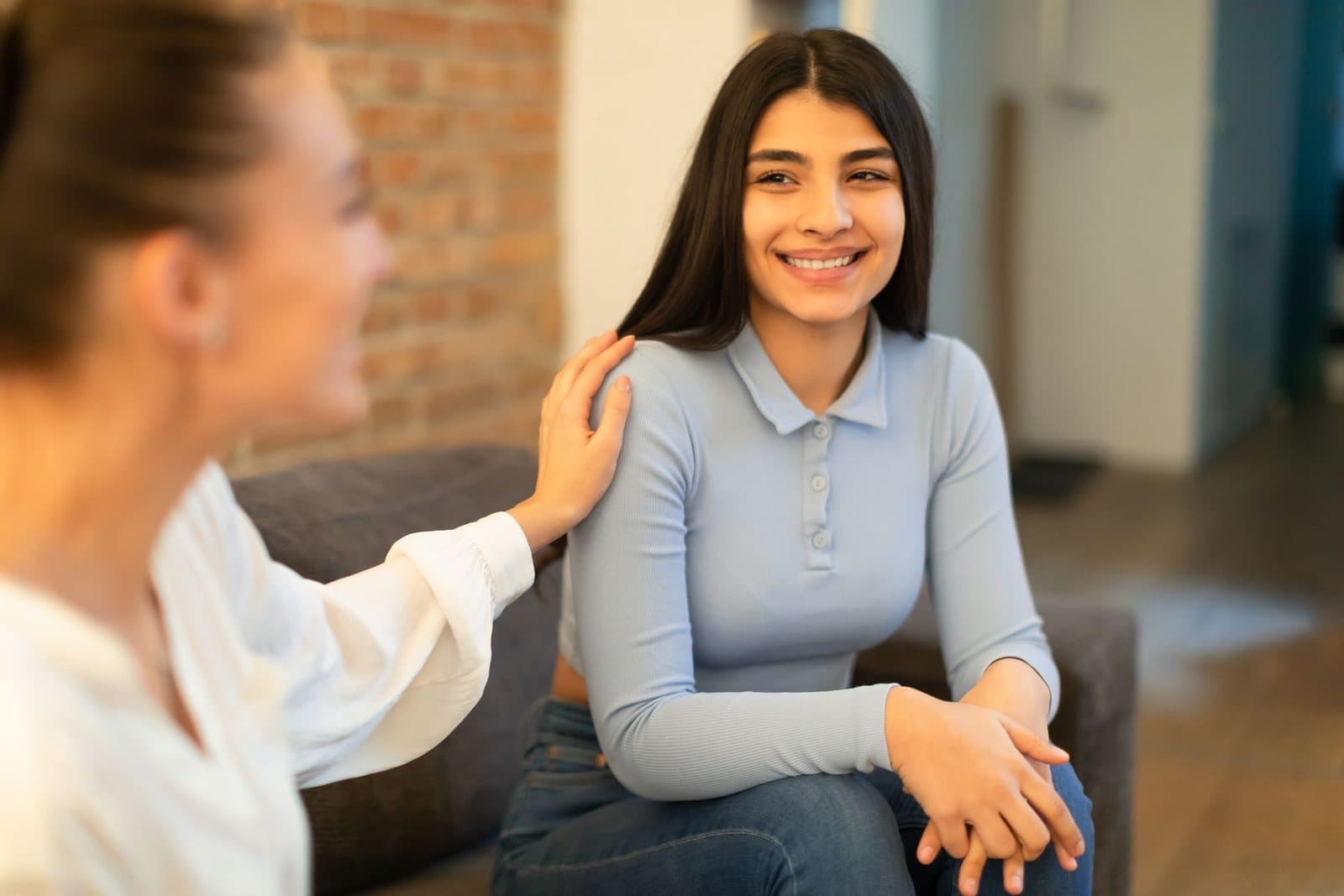 Counselor talking with a teenage client